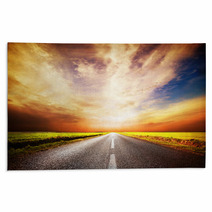 Empty Long And Straight Asphalt Road. Sunset Sky Rugs 52538678