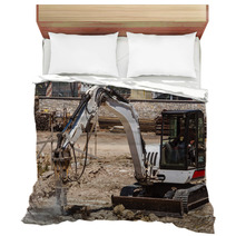 Excavator With Hammer Engaged In Excavation Of Foundation Bedding 56589103