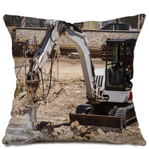 Excavator With Hammer Engaged In Excavation Of Foundation Pillows 56589103