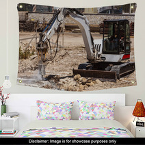 Excavator With Hammer Engaged In Excavation Of Foundation Wall Art 56589103