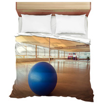 Exercise Ball For Fitness On Wooden Floor Bedding 128490918