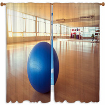 Exercise Ball For Fitness On Wooden Floor Window Curtains 128490918