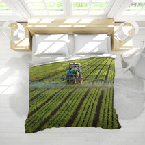 Farming Tractor Spaying A Field Bedding 16325792