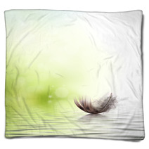 Feather Drifting On Water Background Blankets 42681725