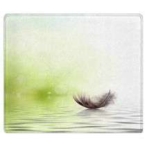 Feather Drifting On Water Background Rugs 42681725