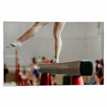 Feet Young Athlete Girls Gymnast Exercises On Balance Beam Rugs 142927800