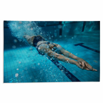 Female Swimmer At The Swimming Pool.Underwater Photo. Rugs 77446323