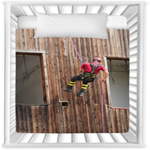 Firefighter Climber Down Into The Wall Of The House In Abseiling Nursery Decor 65583718