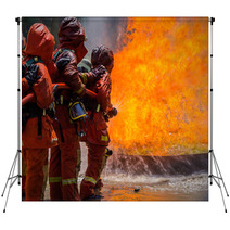 Firefighter Fighting For A Fire Attack During A Training Backdrops 65688075