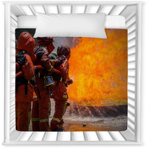 Firefighter Fighting For A Fire Attack During A Training Nursery Decor 65688075
