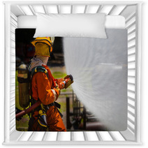 Firefighter Fighting For A Fire Attack During A Training Nursery Decor 65688077