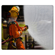 Firefighter Fighting For A Fire Attack During A Training Rugs 65688077