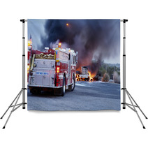 Firemen Fight A Fire That Has Involved Industrial Trucks Backdrops 10337444