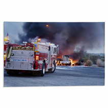 Firemen Fight A Fire That Has Involved Industrial Trucks Rugs 10337444