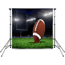 Football Ball On Grass In A Stadium Backdrops 62470185