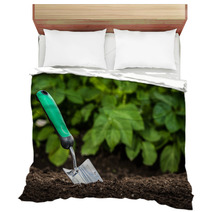 Gardening Shovel In The Soil Bedding 66899751