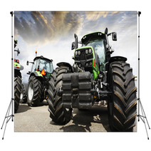 Giant Tractors Set Against A Sunset Sky And Clouds Backdrops 67295763