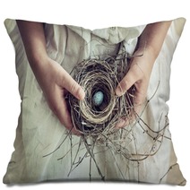 Girl Holding Blue Speckled Egg In Bird Nest On Lap Pillows 64772362