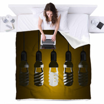 Glowing Spiral Light Bulb Hanging Among Dead Ones Blankets 67587014