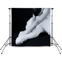 Grayscale Ballerina Stretching On The Floor Backdrops 62591438