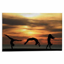 Group Of Gymnasts Tumbling In Sunset Rugs 48042586
