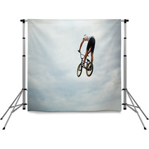 Guy Jumps On Bike Backdrops 55251710