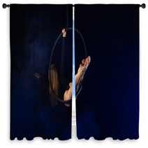 Gymnast Girl Aerial Acrobatics On The Ring On The Background Of Blue Smoke In The Dark Window Curtains 252480243
