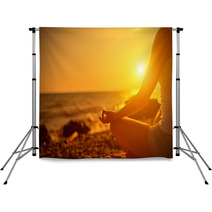 Hand Of  Woman Meditating In A Yoga Pose On Beach At Sunset Backdrops 62847043