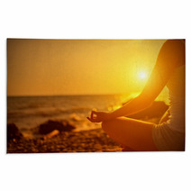 Hand Of  Woman Meditating In A Yoga Pose On Beach At Sunset Rugs 62847043
