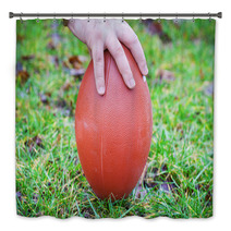 Hand On Rugby Ball On Green Grass Background Bath Decor 60202151