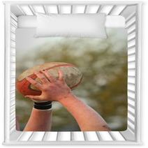 Hands Holding A Rugby Ball Nursery Decor 61889606
