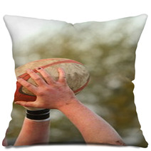 Hands Holding A Rugby Ball Pillows 61889606