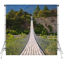 Hanging Bridge Over Seasonal River Backdrops 67010742