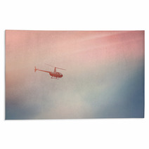 Helicopter Flying In The Blue Sky With Sunlight Rugs 143355564