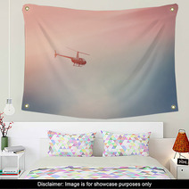 Helicopter Flying In The Blue Sky With Sunlight Wall Art 143355564