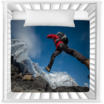 Hiker Jumps Over Rocks In Himalaya Mountains Nursery Decor 64747093