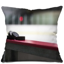 Hockey Pucks Resting On The Boards Pillows 123980919