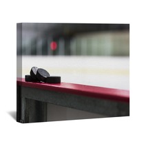 Hockey Pucks Resting On The Boards Wall Art 123980919