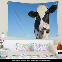 Holstein Cow Against Blue Sky Wall Art 46451167