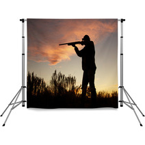 Hunter Silhouetted Shooting At Sunset Backdrops 59928266