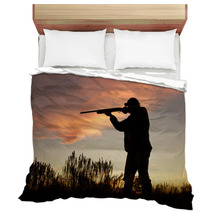 Hunter Silhouetted Shooting At Sunset Bedding 59928266