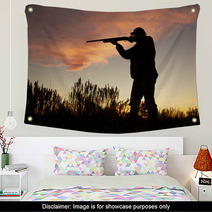Hunter Silhouetted Shooting At Sunset Wall Art 59928266