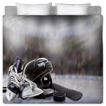 Ice Hockey Helmet Skates Stick And Puck In Rink Bedding 180382351