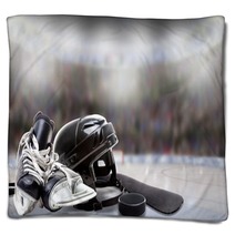 Ice Hockey Helmet Skates Stick And Puck In Rink Blankets 180382351