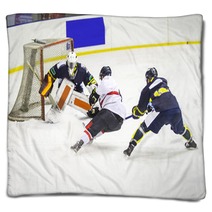 Ice Hockey Player During A Game Blankets 139592023