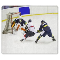 Ice Hockey Player During A Game Rugs 139592023