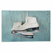 Ice Skates On Blue Vintage Wooden Background Rugs 56600579