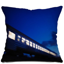 Illuminated Train Traveling Past At Night Pillows 63092536