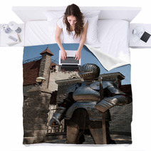 Knight In The Ancient Metal Armor Standing Near The Stone Wall Blankets 66227892