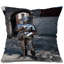 Knight In The Ancient Metal Armor Standing Near The Stone Wall Pillows 66227995